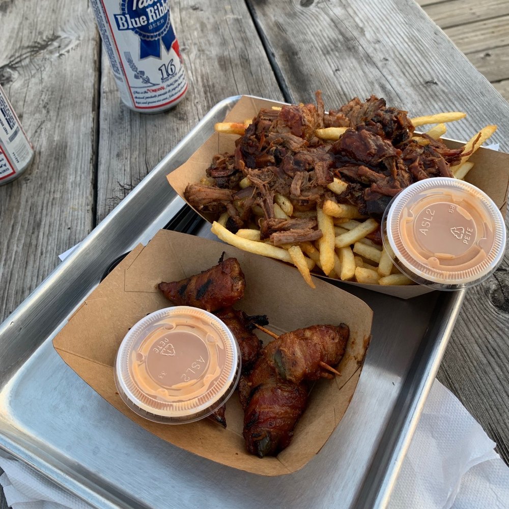 The Seafarer Bar - two trays of food on a picnic table - American Near Me - Highlands, New Jersey The Seafarer Bar - two trays of food on a picnic table - American Near Me - Highlands, New Jersey