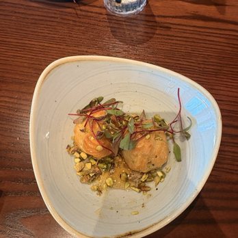 Margaux Brasserie - appetizer (we ate most of the puffs at this point) TRUFFLED GOAT CHEESE GOUGERES - French Near Me - Brookfield, Wisconsin