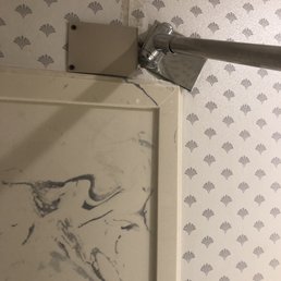 Broken shower rod that has been attempted to fix Broken shower rod that has been attempted to fix