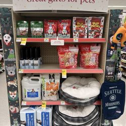 Walgreens - Pet costumes for holiday is on the right of this endstand