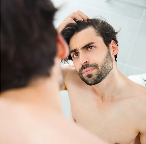 Revolutio Hair Loss & Wellness Clinic Logo