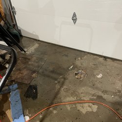 Knight Heating & Air Conditioning - Water running out garage door