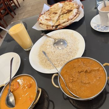 Sara's Grill & Eastern Cuisine - Mango Lassi, Chai, 5 Piece Chicken Tikka Masala, Butter Chicken, Large Zeera Rice, Tandoori Naan, & Garlic Naan. - Indian Near Me - Naperville, Illinois Sara's Grill & Eastern Cuisine - Mango Lassi, Chai, 5 Piece Chicken Tikka Masala, Butter Chicken, Large Zeera Rice, Tandoori Naan, & Garlic Naan. - Indian Near Me - Naperville, Illinois