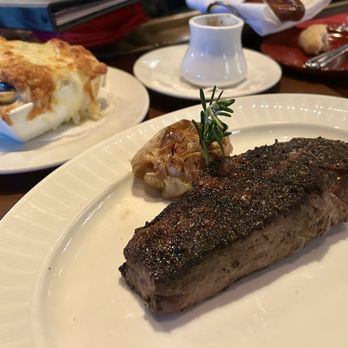 Strip House Steakhouse - 14oz Dry-aged NY Strip Steak with and Potatoes - Steakhouses Near Me - New York, New York