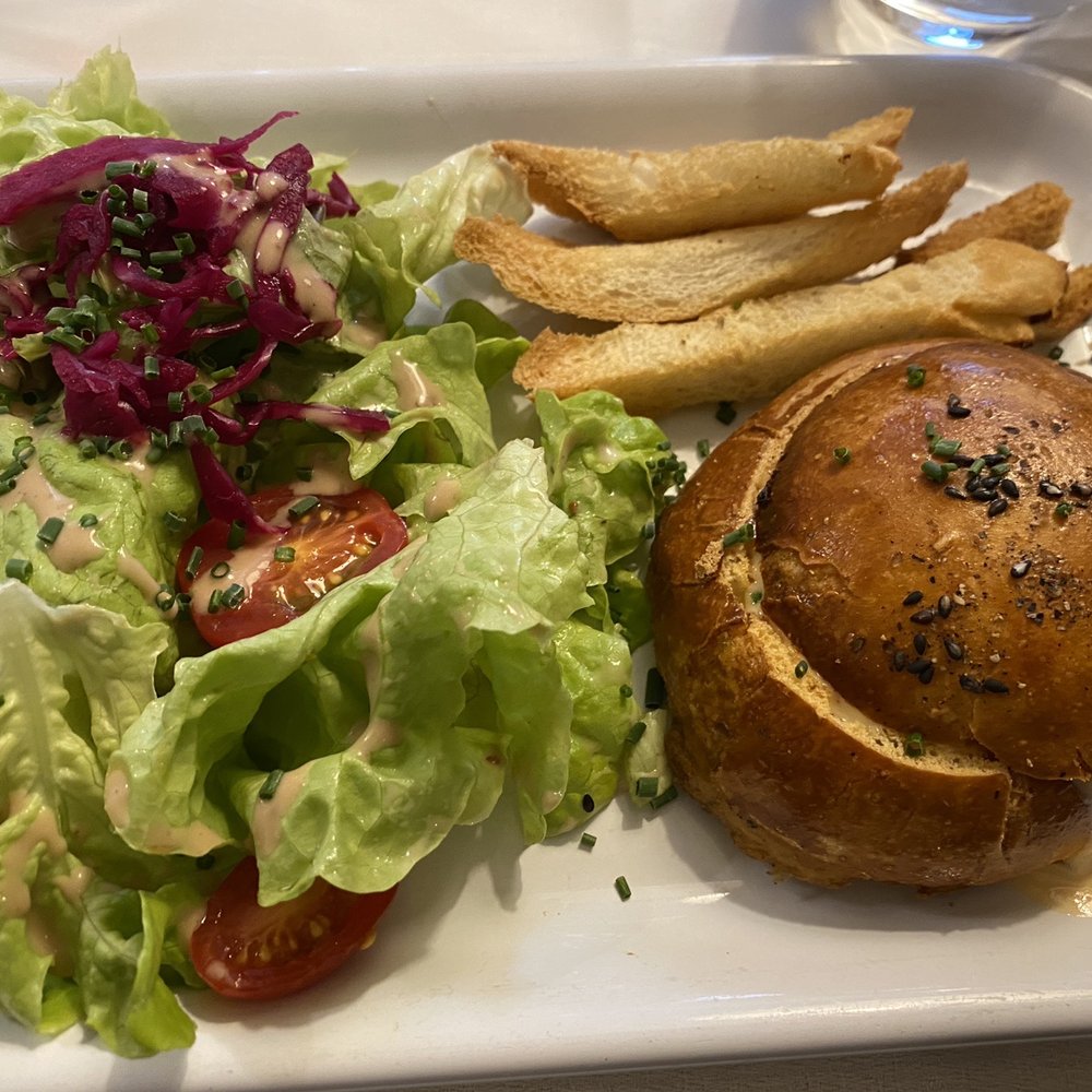 Salad, perfectly crisp fries and a mini bread bowl with a warm dip inside.