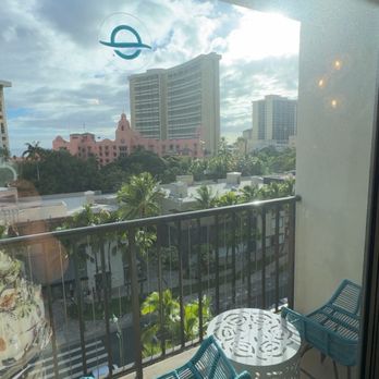 Outrigger Waikiki Beachcomber Hotel - View to the right of the Lani from inside the room. Seating outside - Hotels Near Me - Honolulu, Hawaii Outrigger Waikiki Beachcomber Hotel - View to the right of the Lani from inside the room. Seating outside - Hotels Near Me - Honolulu, Hawaii