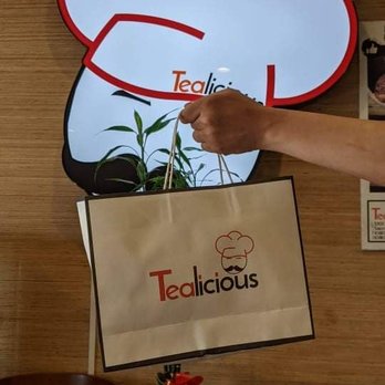 Tealicious - The drinks in the bag are Mango slush, jasmine milk tea, and Signature passion fruit tea. - Bubble Tea Near Me - Sacramento, California