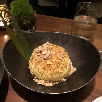 Indian Accent - makhan malai, saffron milk, rose petal jaggery brittle, almonds - Indian Near Me - New York, New York Indian Accent - makhan malai, saffron milk, rose petal jaggery brittle, almonds - Indian Near Me - New York, New York
