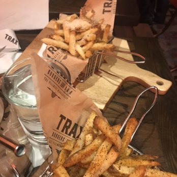 Trax Burgers And Bar - Cajun fries and truffle Parmesan fries - American Near Me - Minneapolis, Minnesota Trax Burgers And Bar - Cajun fries and truffle Parmesan fries - American Near Me - Minneapolis, Minnesota