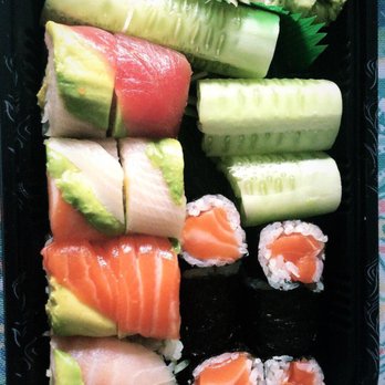 New Kanda - Rainbow Roll and a Salmon roll - Sushi Bars Near Me - Levittown, New York New Kanda - Rainbow Roll and a Salmon roll - Sushi Bars Near Me - Levittown, New York