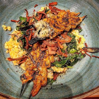 M'tucci's Twenty-Five - Shrimp & grits with sautéed kale. - Italian Near Me - Albuquerque, New Mexico M'tucci's Twenty-Five - Shrimp & grits with sautéed kale. - Italian Near Me - Albuquerque, New Mexico