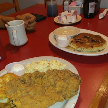 Humble City Cafe - The biggest breakfast combo with potatoes, eggs, chicken fried steak, pancakes and a biscuit - American Near Me - Humble, Texas