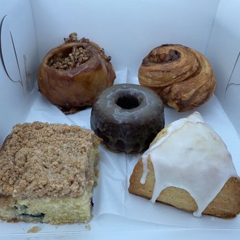 Sweet Rustic Bake Shop - Sticky bun, morning bun, middle is sticky toffee pudding, blueberry coffee cake, vanilla bean scone - Desserts Near Me Sweet Rustic Bake Shop - Sticky bun, morning bun, middle is sticky toffee pudding, blueberry coffee cake, vanilla bean scone - Desserts Near Me