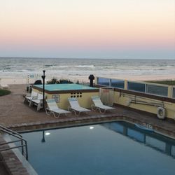 Coastal Getaway Vacations - Pool area overlooking the beach