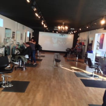 Alex Mackison - Movie wall in big room! - Hair Stylists Near Me - Denver, Colorado