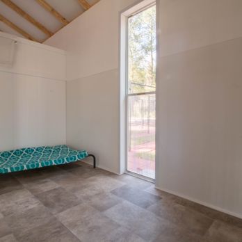 The Ranch Woodlands - Inside a large suite at Woodlands Dog Suites - Pet Boarding Near Me - Magnolia, Texas The Ranch Woodlands - Inside a large suite at Woodlands Dog Suites - Pet Boarding Near Me - Magnolia, Texas