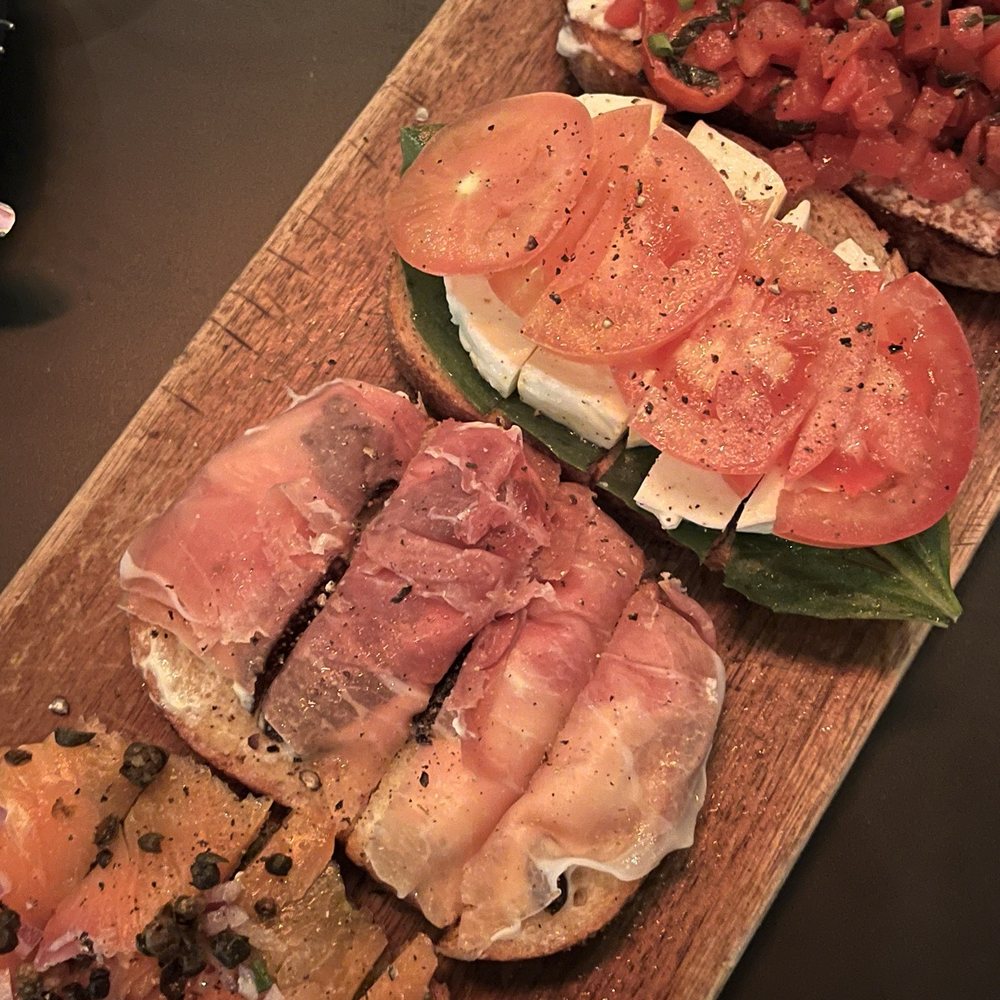 Postino Uptown Park - SMOKED SALMON, PROSCIUTTO DI PARMA, fresh MOZZARELLA & TOMATOES, burrata - Wine Bars Near Me - Houston, Texas Postino Uptown Park - SMOKED SALMON, PROSCIUTTO DI PARMA, fresh MOZZARELLA & TOMATOES, burrata - Wine Bars Near Me - Houston, Texas