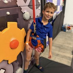 Outer Limits Adventure Park - Climbing the wall!