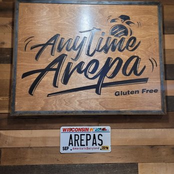 Anytime Arepa - a sign for a restaurant - Venezuelan Near Me - Milwaukee, Wisconsin Anytime Arepa - a sign for a restaurant - Venezuelan Near Me - Milwaukee, Wisconsin