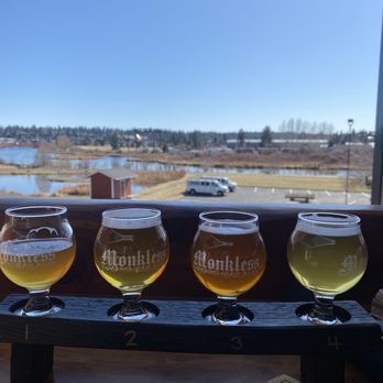Monkless Belgian Ales - Outside view facing the river. I picked my own flight! - Belgian Near Me - Bend, Oregon