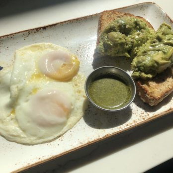 First Watch - Avocado toast with basted eggs and side of pesto - Breakfast & Brunch Near Me - Nashville, Tennessee First Watch - Avocado toast with basted eggs and side of pesto - Breakfast & Brunch Near Me - Nashville, Tennessee