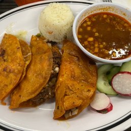 I wish I could tell you the name of what this was, but I can't. It's braised brisket in a fried taco shell that you pour the broth over. I wish I could tell you the name of what this was, but I can't. It's braised brisket in a fried taco shell that you pour the broth over.