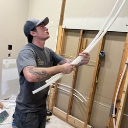 Molberg Plumbing - Avery assisting with the remodel