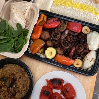 Lavash - Top left clockwise: Tahdig with Stew (Fesenjan), Veggie Kabob, Adas Polo, Tomato, Kashk-e Bademjam (all made vegan!) - Persian/Iranian Near Me - San Francisco, California Lavash - Top left clockwise: Tahdig with Stew (Fesenjan), Veggie Kabob, Adas Polo, Tomato, Kashk-e Bademjam (all made vegan!) - Persian/Iranian Near Me - San Francisco, California