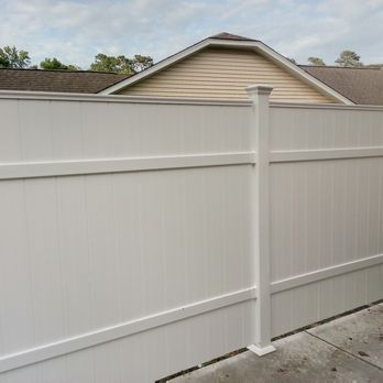 Reef Renovations - a picture of a white vinyl fence - Decks & Railing Near Me - Surfside Beach, South Carolina Reef Renovations - a picture of a white vinyl fence - Decks & Railing Near Me - Surfside Beach, South Carolina