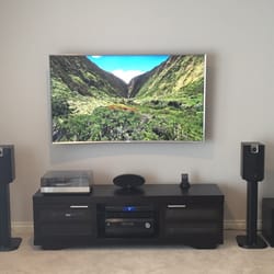 American Home Technology - 7.1 Home Theater with new 65" Samsung Curved 4K Display