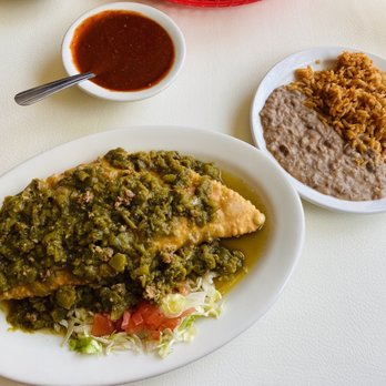 Mary & Tito's - Mexican Turnover with beef and cheese inside, topped with the best green chile ever! Side of rice and beans and red chile. - New Mexican Cuisine Near Me - Albuquerque, New Mexico