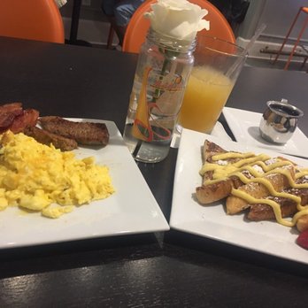 Mango Mangeaux - The spread. The sausage was tasty. Bacon a bit thin, dry and overlooked. - New American Near Me - Hampton, Virginia Mango Mangeaux - The spread. The sausage was tasty. Bacon a bit thin, dry and overlooked. - New American Near Me - Hampton, Virginia