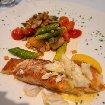 Ouisie's Table - Salmon with crab meat. It usually comes with pasta salad too, but I substituted for ceser salad which is not in picture. - New American Near Me - Houston, Texas Ouisie's Table - Salmon with crab meat. It usually comes with pasta salad too, but I substituted for ceser salad which is not in picture. - New American Near Me - Houston, Texas