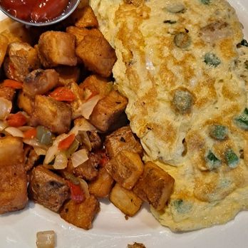 Harper's - Seafood omelet with fried potatoes - Breakfast & Brunch Near Me - Atlantic City, New Jersey Harper's - Seafood omelet with fried potatoes - Breakfast & Brunch Near Me - Atlantic City, New Jersey