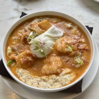 The Dewberry - Shrimp and Grits with and egg! - Hotels Near Me - Charleston, South Carolina