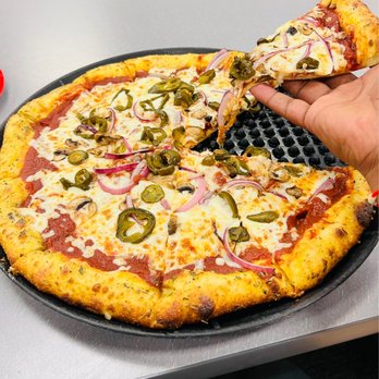 Chuck E. Cheese - Stuffed cheese pizza with jalapeños, onions and mushrooms - Pizza Near Me - San Antonio, Texas Chuck E. Cheese - Stuffed cheese pizza with jalapeños, onions and mushrooms - Pizza Near Me - San Antonio, Texas