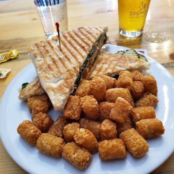Two Penguins Tap & Grill - Spicy Italian Turkey panini with tots - Beer Gardens Near Me - Centennial, Colorado Two Penguins Tap & Grill - Spicy Italian Turkey panini with tots - Beer Gardens Near Me - Centennial, Colorado