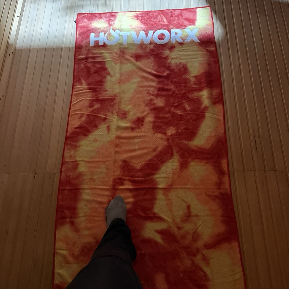 HOTWORX - Houston TX - Summerwood - Hotworx towel and yoga mat. They say you need this due to the heat from the infrared. Can't use a regular mat. - Yoga Near Me - Houston, Texas
