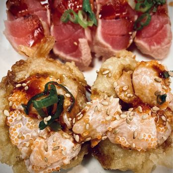 Sushi Pier - (Background) seared tuna nigiri; (foreground) tempura upside-down shrimp nigiri - Sushi Bars Near Me - Reno, Nevada Sushi Pier - (Background) seared tuna nigiri; (foreground) tempura upside-down shrimp nigiri - Sushi Bars Near Me - Reno, Nevada