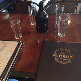Miners Saloon - The menu with glasses and water jug - Cocktail Bars Near Me - Golden, Colorado Miners Saloon - The menu with glasses and water jug - Cocktail Bars Near Me - Golden, Colorado