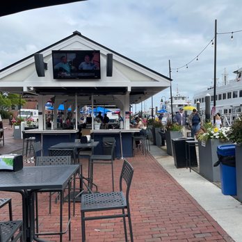 The Landing - a restaurant with tables and chairs - Bars Near Me - Boston, Massachusetts The Landing - a restaurant with tables and chairs - Bars Near Me - Boston, Massachusetts