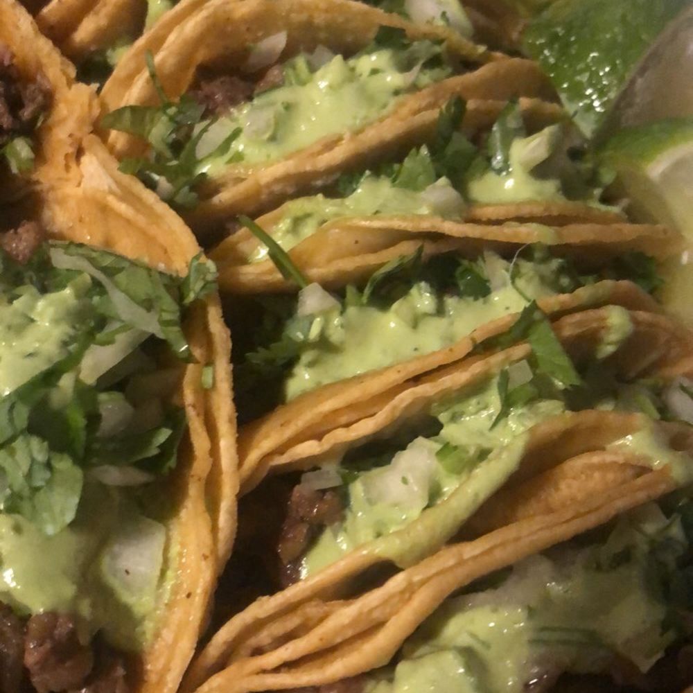 Steak tacos with their guacamole salsa, onions and cilantro. Served with lime and hot or mild sauce. Steak tacos with their guacamole salsa, onions and cilantro. Served with lime and hot or mild sauce.