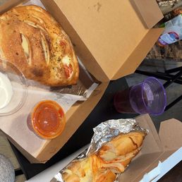 Pepperoni calzone and a meatball Parm hero Pepperoni calzone and a meatball Parm hero