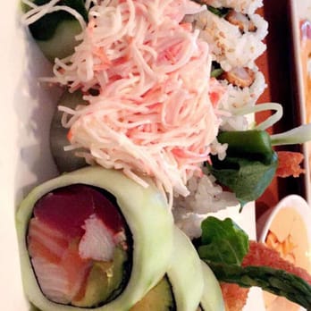 Kotobuki - Jumping Shrimp roll in the back and SHOGUN in the front with cucumber wrappings - Japanese Near Me - Hauppauge, New York Kotobuki - Jumping Shrimp roll in the back and SHOGUN in the front with cucumber wrappings - Japanese Near Me - Hauppauge, New York