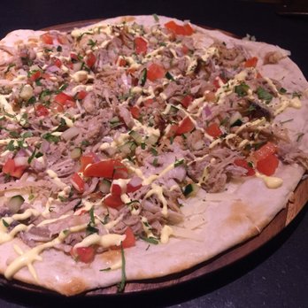 Bubo - Pork Belly Flatbread uncooked bread - Cocktail Bars Near Me - New York, New York