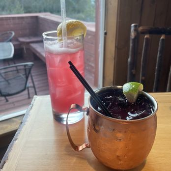 Snowgoose Grille - Huckleberry spiked lemonade and bear proof mule (both very good) - American Near Me - Saint Mary, Montana