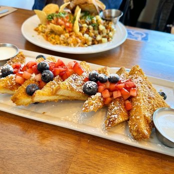 Blu Jam Cafe - A must! Signature Crunchy French Toast ($15.95) with addictive vanilla bean sauce - Breakfast & Brunch Near Me - Los Angeles, California Blu Jam Cafe - A must! Signature Crunchy French Toast ($15.95) with addictive vanilla bean sauce - Breakfast & Brunch Near Me - Los Angeles, California