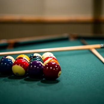 The O Bar - a pool table with balls and cues - Sports Bars Near Me - Osprey, Florida The O Bar - a pool table with balls and cues - Sports Bars Near Me - Osprey, Florida