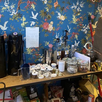 Stopgap Coffee - a shelf with a variety of items - Coffee & Tea Near Me - Edmonton, Alberta