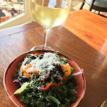 The Conservatory - Kale salad & glass of Pinot Grigio - New American Near Me - Half Moon Bay, California The Conservatory - Kale salad & glass of Pinot Grigio - New American Near Me - Half Moon Bay, California